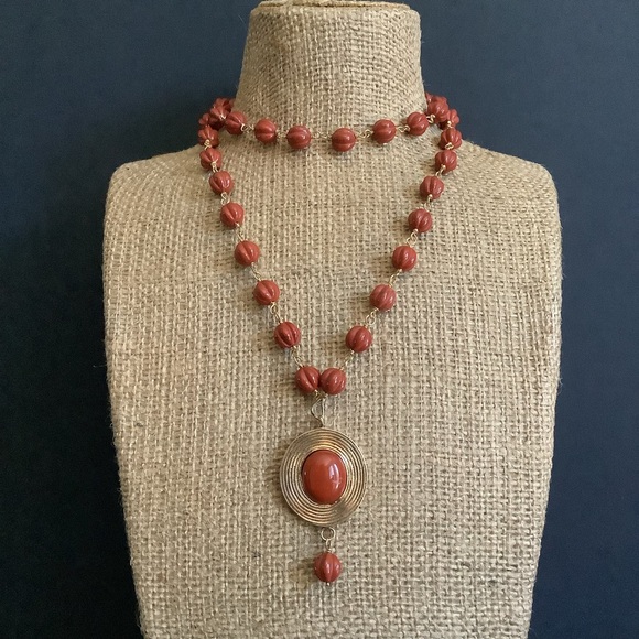 Vintage gold over sterling genuine carved jasper pendant necklace.